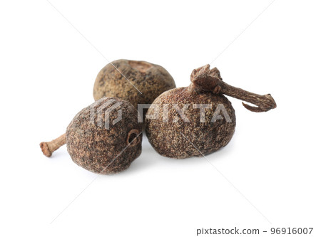 Spicy black pepper grains isolated on white Spicy black pepper grains isolated on white 96916007