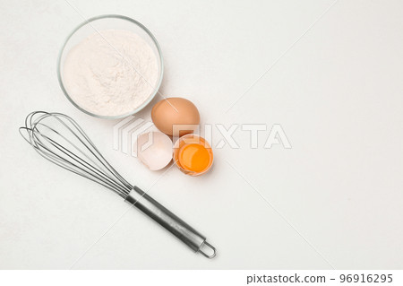 Flat lay composition with raw eggs on white table, space for text. Baking pie Flat lay composition with raw eggs on white table, space for text. Baking pie 96916295