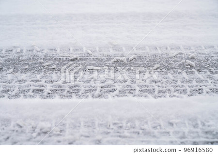 frozen road with snow 96916580