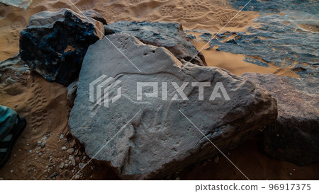 Cow - Cave paintings and petroglyphs at Tamezguida in Tassili nAjjer national park, Algeria 96917375