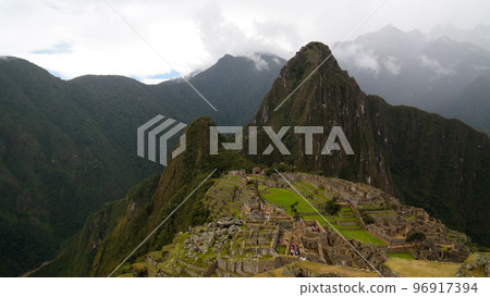 Aerial Panoramic view to Machu Picchu archaeological site and Huayna Picchu mountain , Cuzco, Peru Aerial Panoramic view to Machu Picchu archaeological site and Huayna Picchu mountain , Cuzco, Peru 96917394