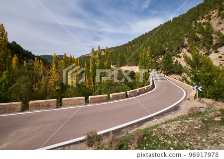 a well-trodden road in the autumn forest a well-trodden road in the autumn forest 96917978