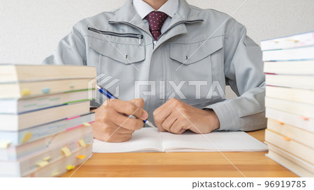 Image of a construction businessman aiming to acquire qualifications while working 96919785