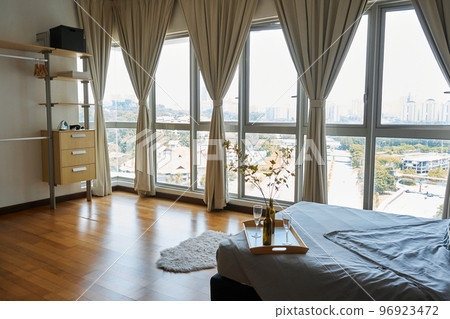 cozy bright studio room interior with huge panoramic windows cozy bright studio room interior with huge panoramic windows 96923472