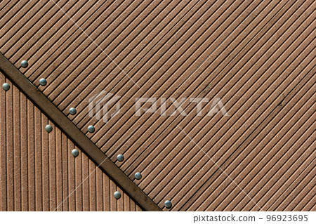 Old grungy, dirty and scratched metal plate with screws Old grungy, dirty and scratched metal plate with screws 96923695
