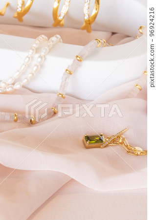 Girl jewelry accessories including earrings and necklaces on display 96924216