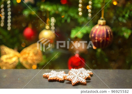 homemade gingerbread cookies on Christmas tree background 96925582
