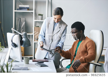 Business people Discussing Document 96925635