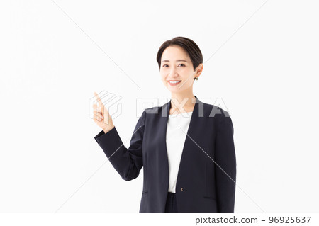 Woman in pointing pose photo material Woman in pointing pose photo material 96925637