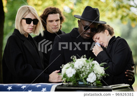 Woman crying at funeral Woman crying at funeral 96926381