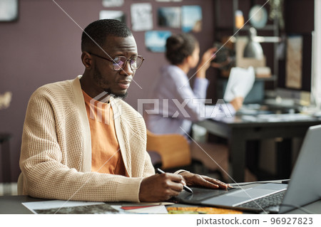 Graphic Designer Creating Logotype 96927823