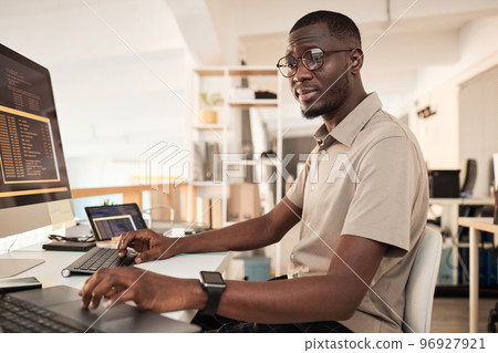 Devops Engineer Examining Programming Code Devops Engineer Examining Programming Code 96927921