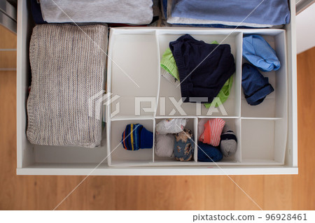 Vertical clothing storage ideas. Vertical clothing storage ideas. 96928461
