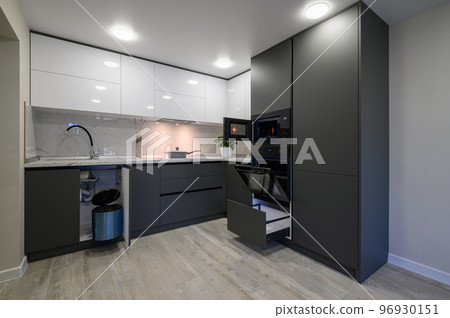 Modern simple trendy dark grey and white kitchen Modern simple trendy dark grey and white kitchen 96930151