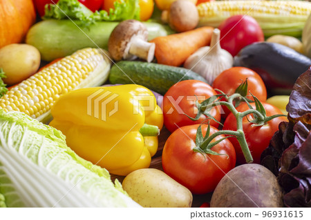 Assortment of the fresh ripe vegetables on wooden background 96931615