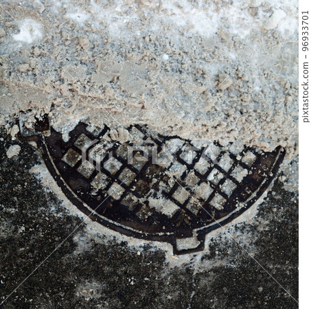 Manhole in the snow in winter. Manhole in the snow in winter. 96933701
