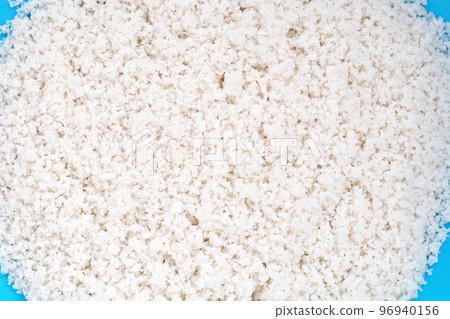 Flower of salt on blue background. 96940156