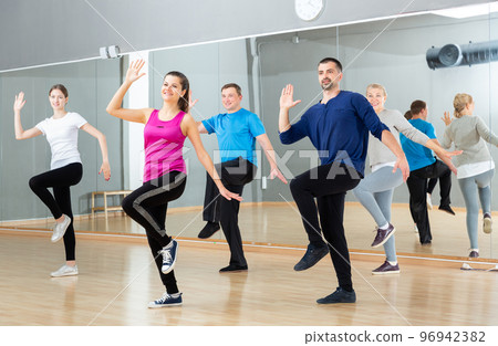 Adult people training in dance studio 96942382