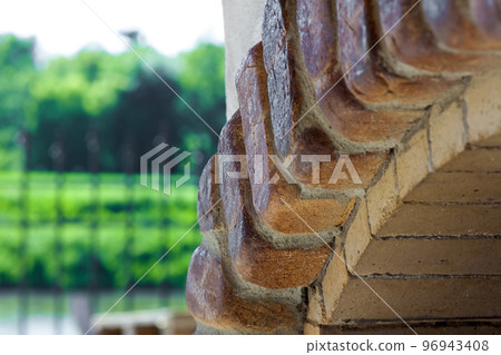 Yellow and orange old bricks in form of arch Yellow and orange old bricks in form of arch 96943408