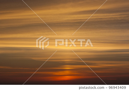 Yellow and orange dramatic sunset sky Yellow and orange dramatic sunset sky 96943409