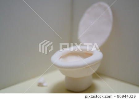 A style toilet with an open lid Western-style toilet made of clay 96944329