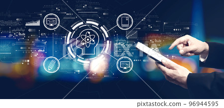 Online education concept with businessman using a tablet computer 96944595