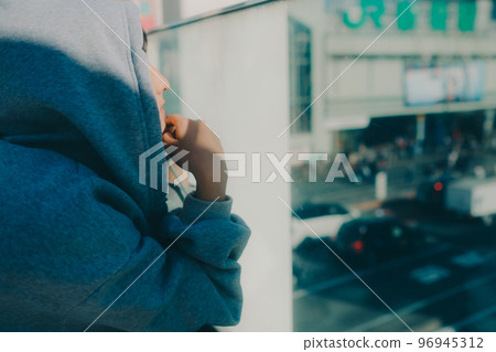 A picture of a high school girl meeting in the city A picture of a high school girl meeting in the city 96945312