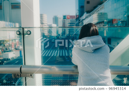 A picture of a high school girl meeting in the city A picture of a high school girl meeting in the city 96945314