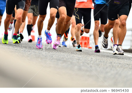 City marathon marathon runner running downhill 96945430
