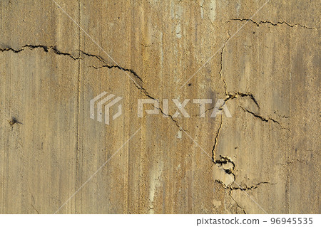 Old grunge background of yellow cracked surface with space for text. 96945535