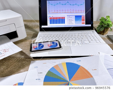 Business image graph and laptop Business image graph and laptop 96945576