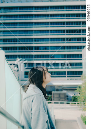 A picture of a high school girl meeting in the city A picture of a high school girl meeting in the city 96946923