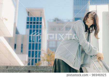A picture of a high school girl meeting in the city A picture of a high school girl meeting in the city 96946925