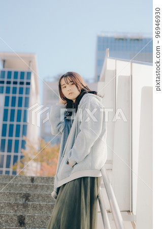 A picture of a high school girl meeting in the city A picture of a high school girl meeting in the city 96946930