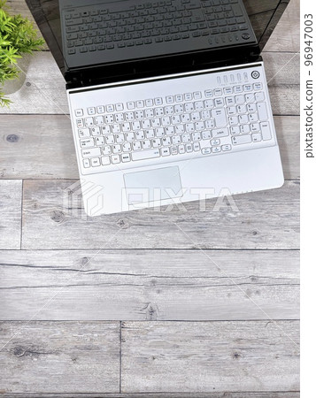 Laptop copy space vertical position bird's eye view Laptop copy space vertical position bird's eye view 96947003