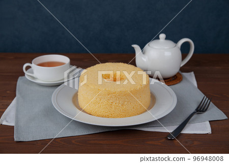 Chiffon cake and tea set wooden table 96948008