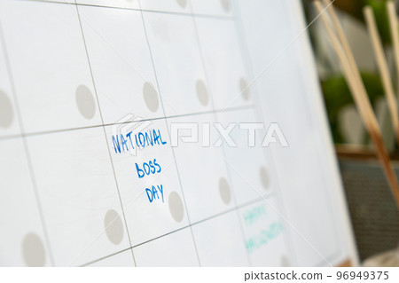 NATIONAL BOSS DAY on calendar to remind important event appointment Monthly PLANNER. Magnetic board with the days of the month. Place to enter important matters schedule. Concept for business planning 96949375