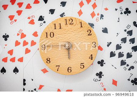 Playing cards and clock 5:45 Playing cards and clock 5:45 96949618