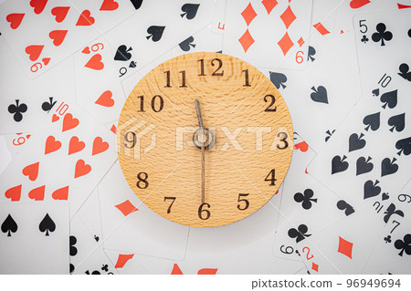 Playing cards and clock 11:30 96949694
