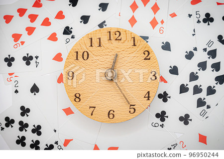 Playing cards and clock 12:25 96950244