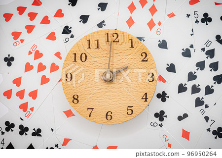 Playing cards and clock 14:00 Playing cards and clock 14:00 96950264