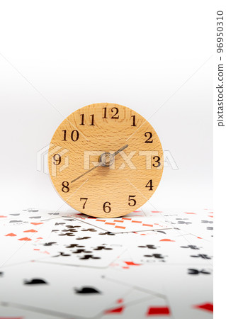 Playing cards and clock 13:40 96950310