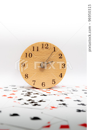 Playing cards and clock 2:05 Playing cards and clock 2:05 96950315