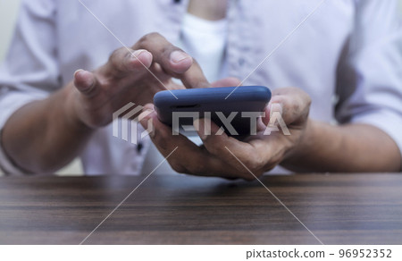 Hand with smart phone black screen isolated on white Hand with smart phone black screen isolated on white 96952352