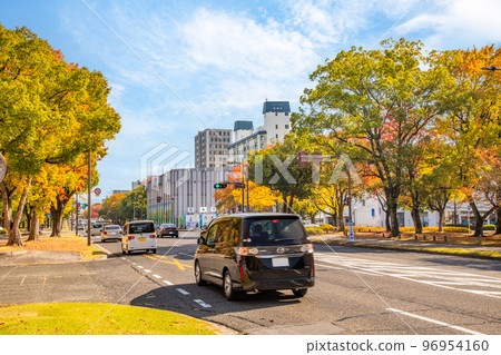 Looking east toward Peace Memorial Park from near Higashikannoncho. Please see the beautiful autumn leaves of Peace Boulevard. Hiroshima 96954160