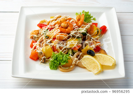 Mayonnaise seafood salad served on white plate Mayonnaise seafood salad served on white plate 96956295