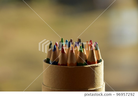 Colored pencils in warm sunlight 96957292
