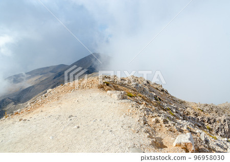 Top of Mount Tahtali in clouds, vicinity of Kemer, Turkey 96958030