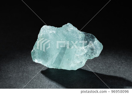Rough Uncut Pale Blue Aquamarine Gemstone on Black 96958096