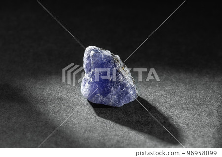 Rough Uncut Blue and Violet Tanzanite Gem on Black 96958099